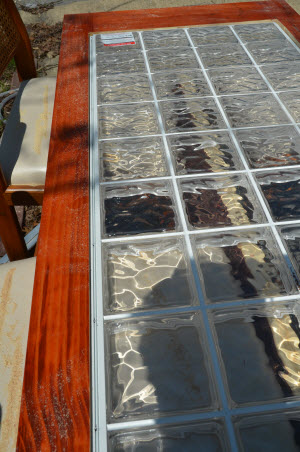 Using Acrylic Blocks To Bring In The Light, Basement Bath Design idea