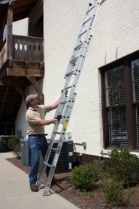 Folded, the Werner 16 ft extension ladder is only six feet long, short enough to fit in a truck bed without hangover
